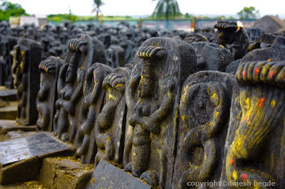 Stone images of snakes in a Hindu temple, India wordspress.com  ghati2.jpg