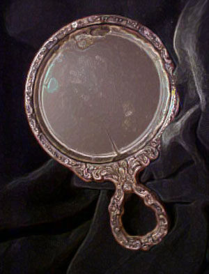 hand-held-ghost-mirror