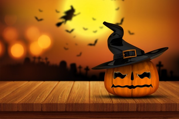 halloween-pumpkin-on-a-wooden-table_1048-3118